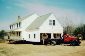 Truck moving building
